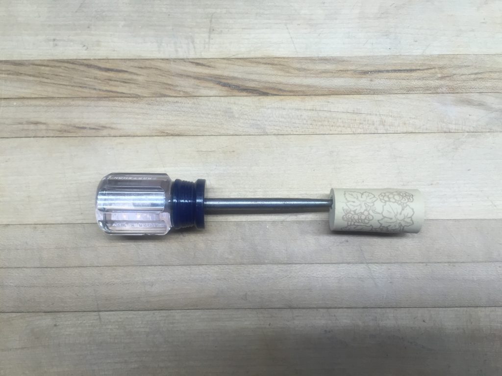 awl in wine cork