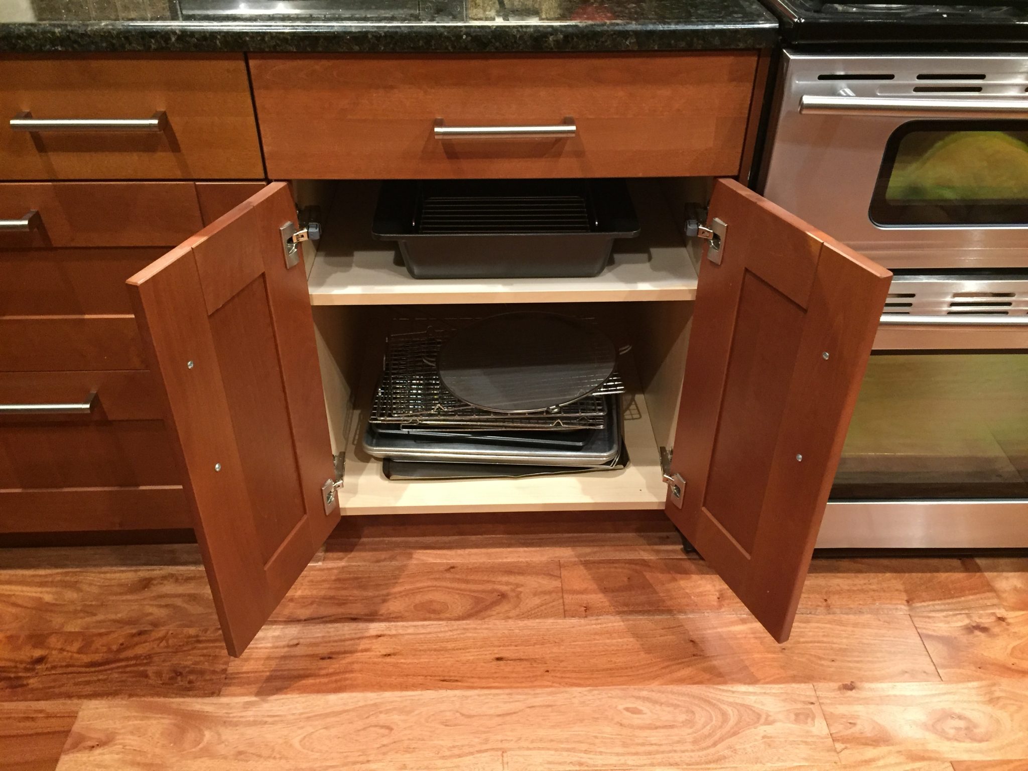 A Jones For Organizing Storing your cookie sheets baking pans and serving trays A Jones For Organizing